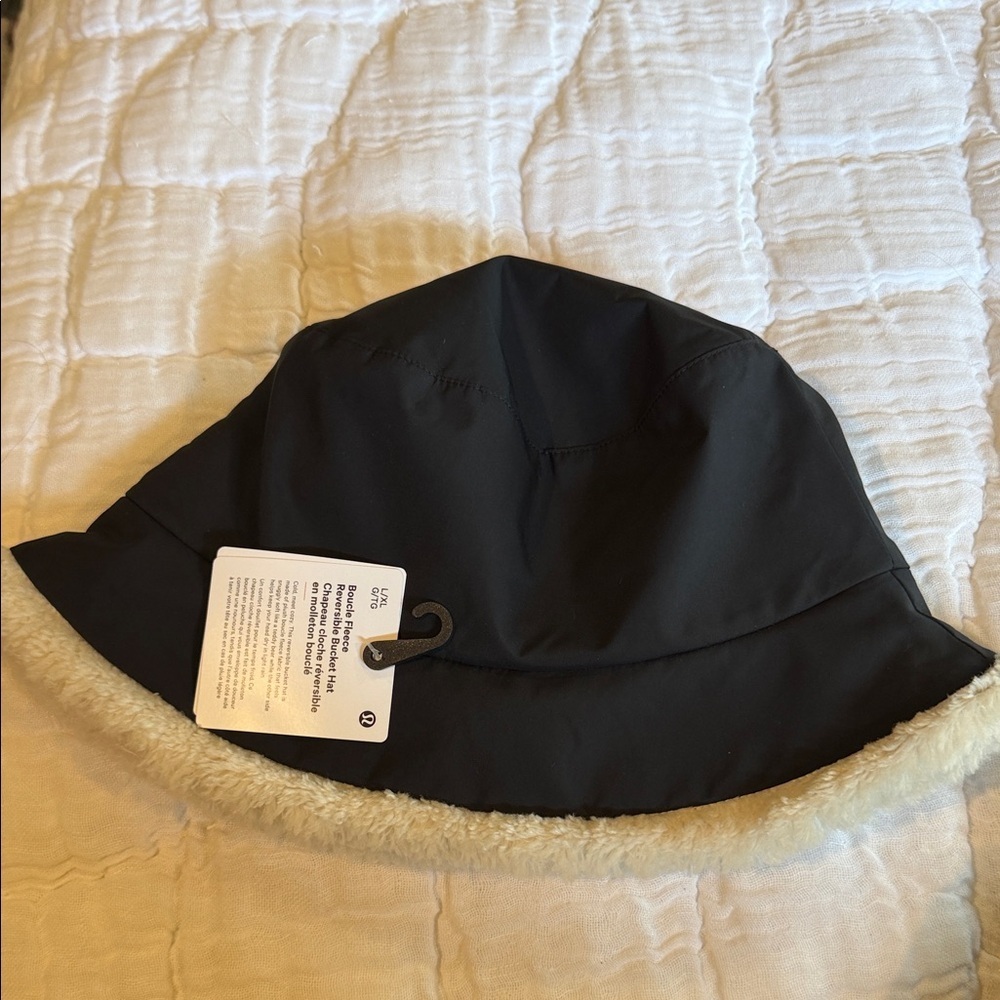lululemon athletica Women’s Black Bucket Hat with Cream Faux-Fur Trim